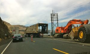 Union Pacific pulling a derailed train off the tracks 