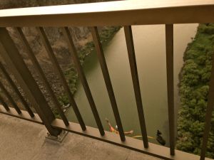 A BASE jumper, pilot chute deploying